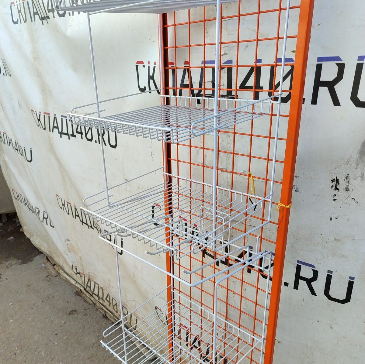 Купить Стойка прикассовая 42/32/190 бело-оранжевая 6 крючков 6 полок